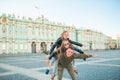 Family of father and little girls visiting the Hermitage, Saint-Petersburg.