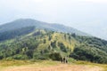 Family father, mother and child are traveling in the mountains