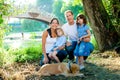 Family father mother kids and dog outdoor Royalty Free Stock Photo