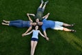 Family, father, mother, son and daughter lying in the meadow Royalty Free Stock Photo