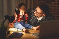 Family father and son baby listening to music with headphones