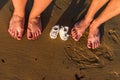 Family feet On Sand