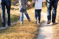 Family feet and legs in jeans. Royalty Free Stock Photo