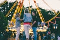 Family at the festival in the Munich Olympic Park in the evening