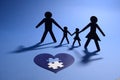 Family figure with jigsaw puzzle heart Royalty Free Stock Photo