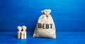 Family figurines and Debt money bag. Financial literacy. Arrears difficult financial situation. Debts restructuring. Inability Royalty Free Stock Photo