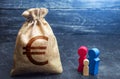Family figurines and euro money bag. Income level, budget. High debt. Social research, consumer preferences. Segmentation.