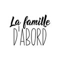 Family first - in French language. Lettering. Ink illustration. Modern brush calligraphy