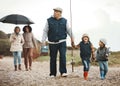 Family, fishing vacation and man, women and happy kids at ocean, weekend hobby and fun together. Grandparents, mom and Royalty Free Stock Photo