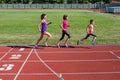 Family fitness, mother and kids running on stadium track, exercise with children  and sport healthy lifestyle Royalty Free Stock Photo