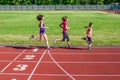 Family fitness, mother and kids running on stadium track, training and children sport healthy lifestyle Royalty Free Stock Photo