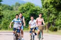 Family of four on bike tour in summer Royalty Free Stock Photo