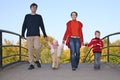 Family of four on bridge Royalty Free Stock Photo