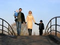 Family of four on bridge Royalty Free Stock Photo