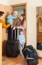 Family of four coming home Royalty Free Stock Photo