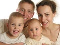 Family of four faces isolated Royalty Free Stock Photo