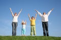 Family of four on grass