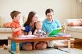 Family of four at home Royalty Free Stock Photo