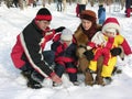 Family of four in winter park Royalty Free Stock Photo