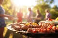 family and friends having a picnic barbeque grill in the garden. Royalty Free Stock Photo