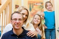 Family in front of computer having video conferenc