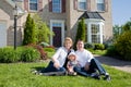 Family in Front of House Royalty Free Stock Photo