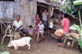 Family in front of them rural house