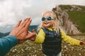 Family fun child high five hands with father active vacations hiking in mountains together healthy lifestyle Royalty Free Stock Photo