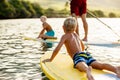 Family Fun, Stand Up Paddling Royalty Free Stock Photo