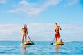 Family Fun, Stand Up Paddling Royalty Free Stock Photo