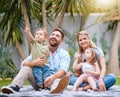 Family garden, bubbles and children with parents together with a smile and quality time. Happy kids, mother and father Royalty Free Stock Photo