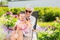 Grandmother and baby granddaughter with phone Royalty Free Stock Photo