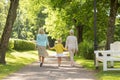 Mother, daughter and grandmother walking at park Royalty Free Stock Photo