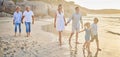 Family generations, walking and beach with sunset for men, women and children with love on holiday. Parents Royalty Free Stock Photo