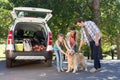 Family getting ready to go on road trip Royalty Free Stock Photo