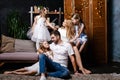 Family with gifts in front of Christmas tree Royalty Free Stock Photo