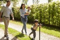 Family Going For Walk In Summer Countryside Royalty Free Stock Photo