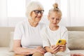 Family grandmother child selfie bonding hugging phone Royalty Free Stock Photo