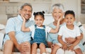 Family, grandparents and grandkids smile in portrait, happiness and bonding at home. Love, care and trust with elderly