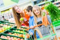 Family grocery shopping in hypermarket Royalty Free Stock Photo