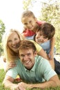 Family Group Having Fun In Park Royalty Free Stock Photo