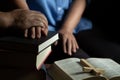 Family group are praying together on wooden table Royalty Free Stock Photo