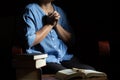 Family group are praying together on wooden table Royalty Free Stock Photo