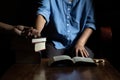 Family group are praying together on wooden table Royalty Free Stock Photo