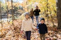 Family Group Relaxing Outdoors In Autumn Landscape Royalty Free Stock Photo