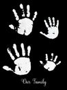 Watercolor family handprints of four illustration on dark black background. Family handprints of three people mom, dad, and child