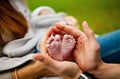 A new born baby foot on father`s hand Royalty Free Stock Photo