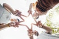 Family, hands together and star fingers outdoor in low angle, happy and bonding. Father, mother and child huddle in love