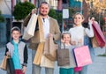 Ã¯Â»Â¿family happily shopping together Royalty Free Stock Photo