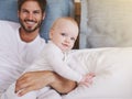 Family, happy and father with baby in bedroom for bonding, relationship and care for parenting. Love, portrait and dad Royalty Free Stock Photo